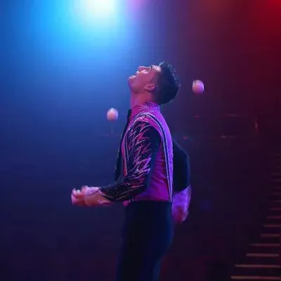 A circus entertainer juggling at the Blackpool Tower Circus