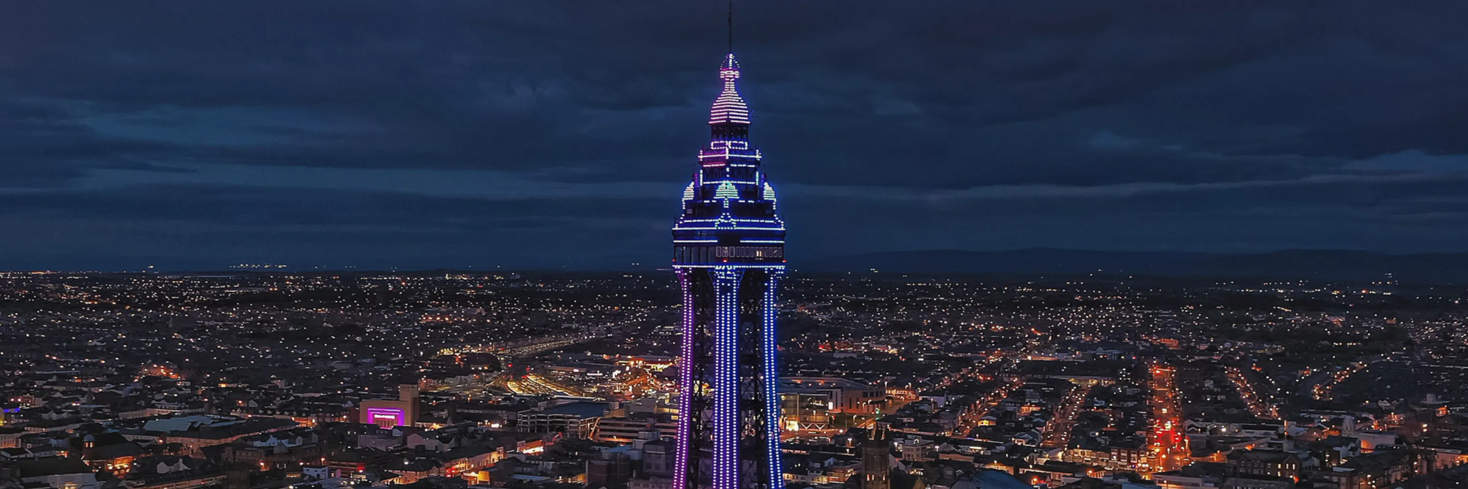 Tower Lit up at Night Banner