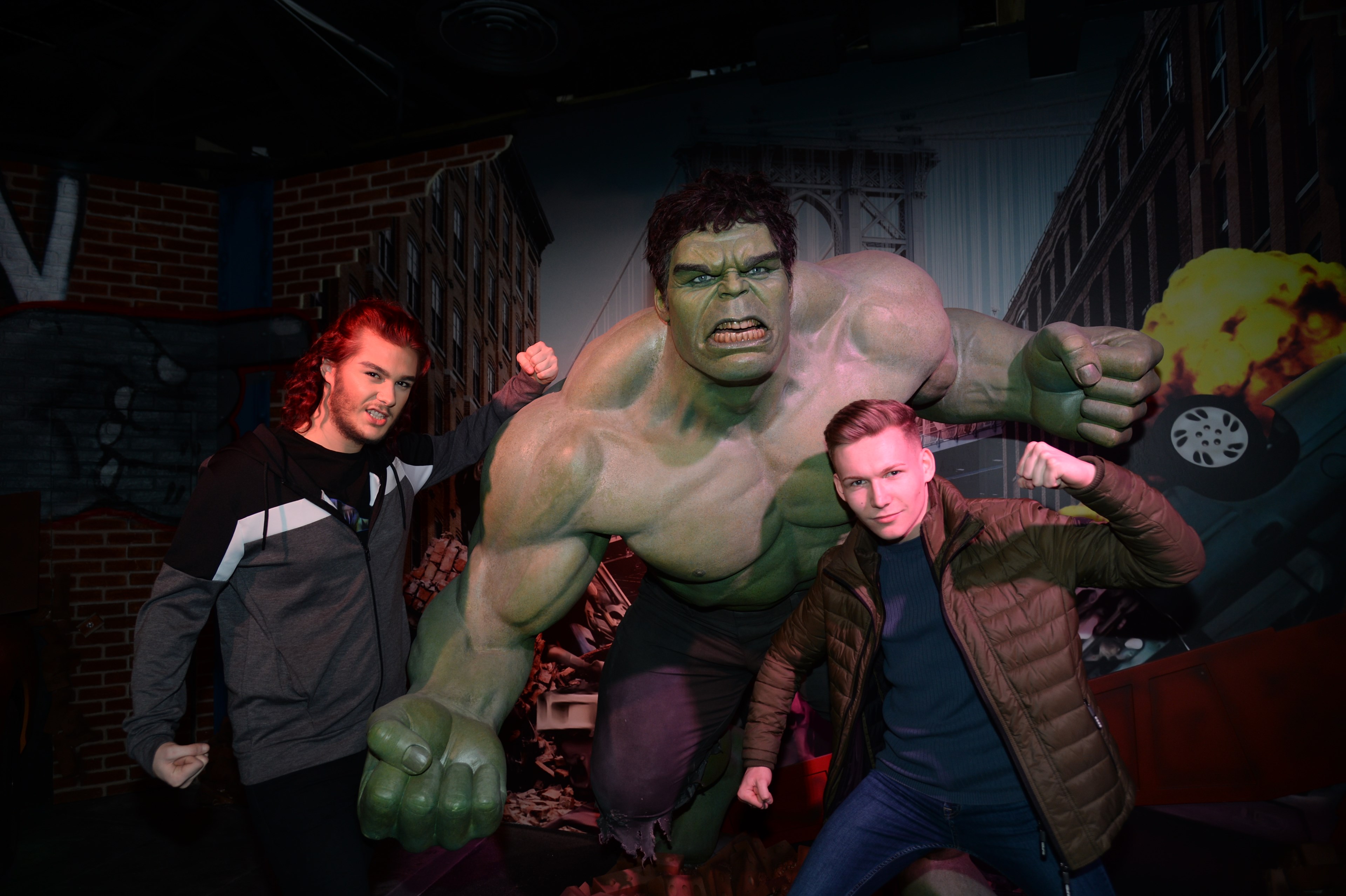 Guests next to Thor wax figure at Madame Tussauds Blackpool