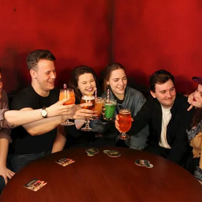 Guests enjoying a drink in the Red Lion Pub at the Blackpool Tower Dungeon