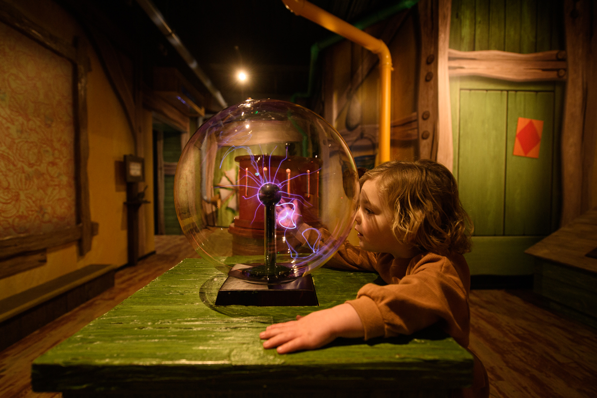 Toddler at the Invention Workshop at Peter Rabbit Explore and Play attraction, Blackpool