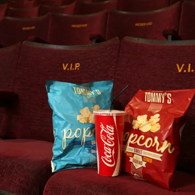 Popcorn snacks and coca cola drink at VIP seating at the Blackpool Tower Circus