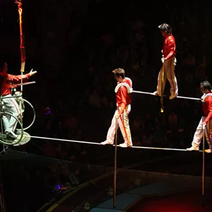 4 Circus performers on a tight rope at the Blackpool Tower Circus